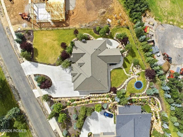 Aerial view of above the property featuring beautiful landscaping