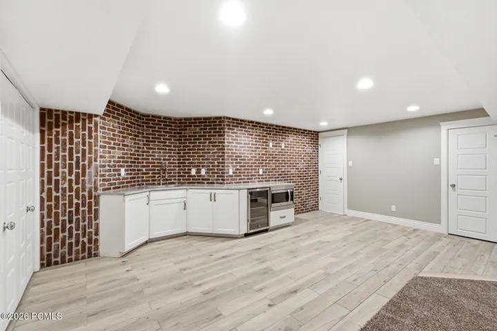 Built in Bar Area with Beverage Fridge and Microwave