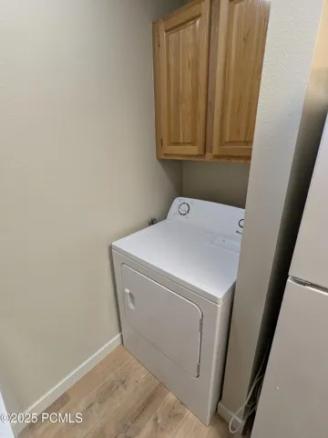 LAUNDRY AT END OF KITCHEN