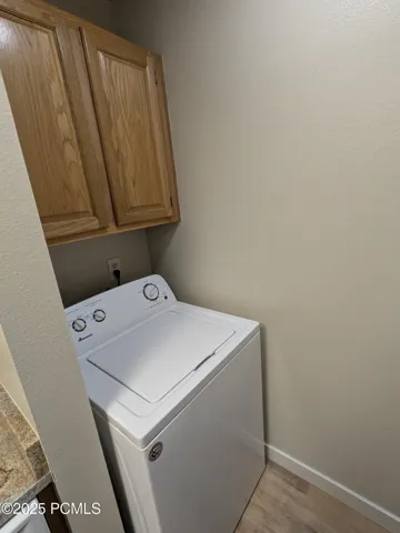 LAUNDRY AT END OF KITCHEN