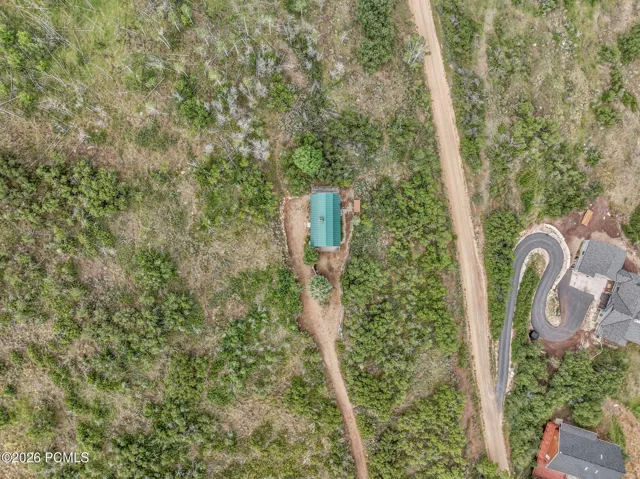 The cabin sits on a 1-acre parcel, and an adjacent 1-acre lot with a separate tax ID may be included with a reasonable offer, bringing the total property size to 2 acres.