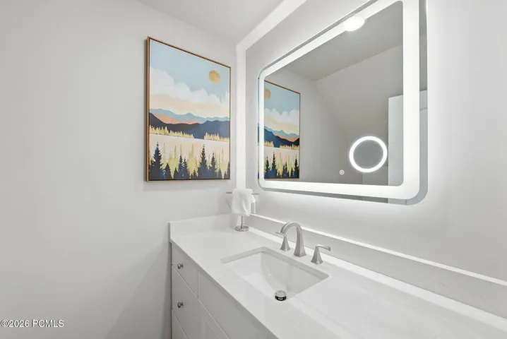 Toilet room vanity in primary suite
