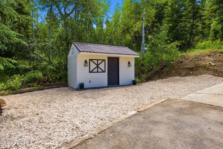 Large shed with parking for two or three more vehicles