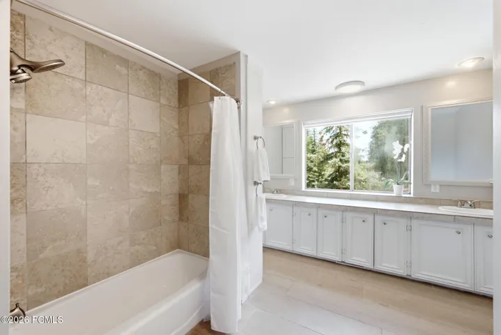 This bathroom also has a washer and dryer not pictured