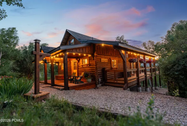 Log home with wraparound decks