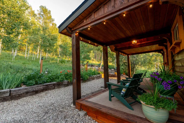 Front porch view looking into half acre of HOA open space.