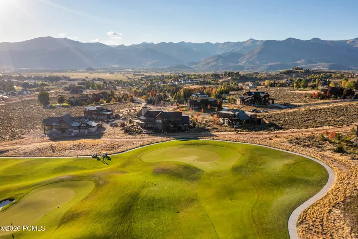 Golf park with home behind green