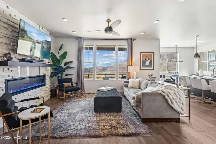 Open living room, kitchen, dining room floor plan with lots of natural light.