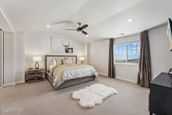 Expansive Primary Suite overlooking the Panoramic Mountain Views of the Timpanogos mountain range.