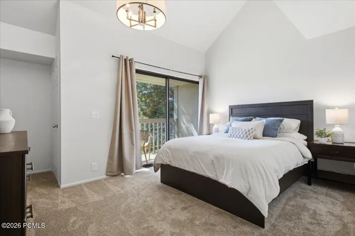 Bright bedroom with balcony access