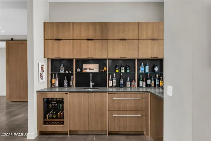 Custom wet bar with built in fridge and ice maker