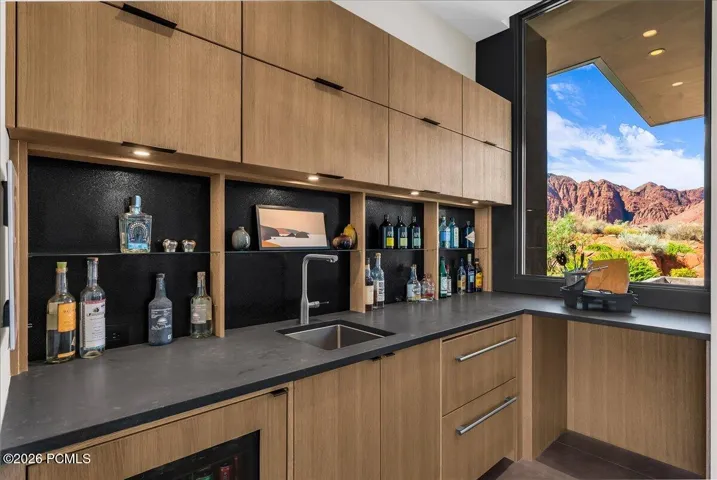 Custom wet bar with built in fridge and ice maker