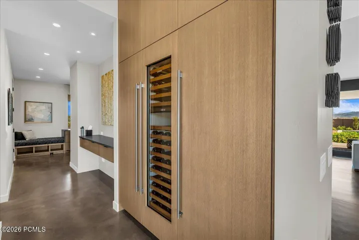 Built in Sub Zero refrigerator, wine fridge and freezer