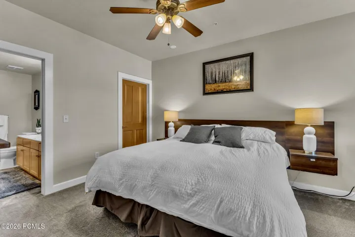 Master bed room with en suite, double vanity, and walk-in closet.