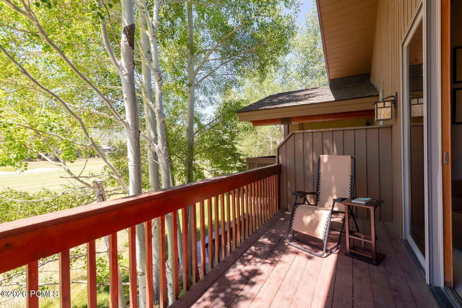 Enjoy quiet time on deck overlooking golf course and mountains