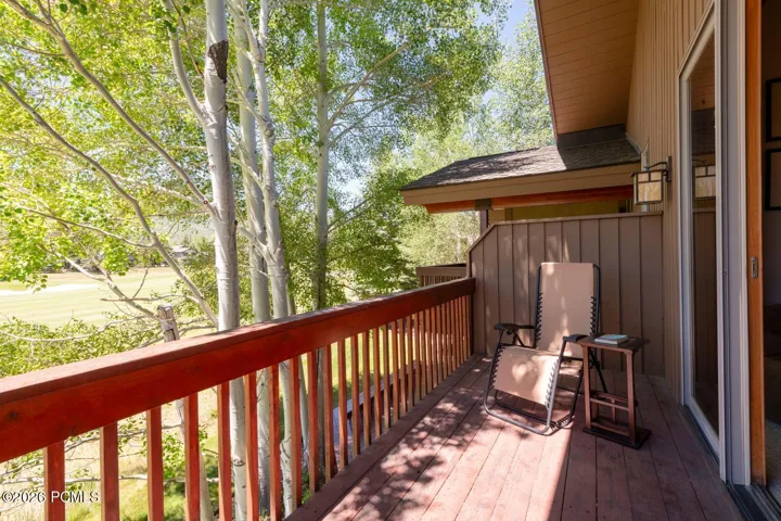 Enjoy quiet time on deck overlooking golf course and mountains