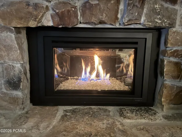 fireplace fan heats entire living room on a chilly morning.