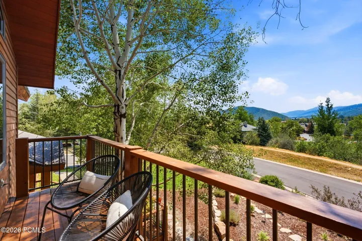 Private balcony with views of the mountains and ski resorts right in the comfort of your primary suite!