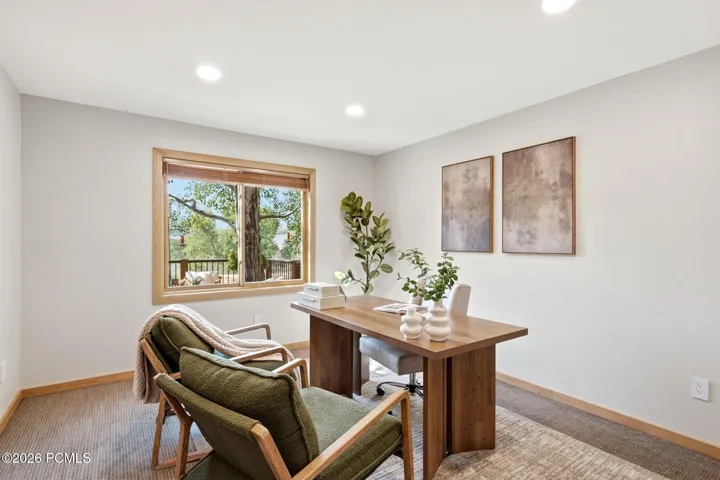 This flex room on the main level of the home can be used as an office, TV room, game room, or additional bedroom.