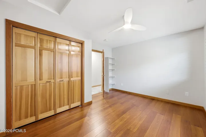 3rd upper level bedroom with hardwood floors and ample closet space.