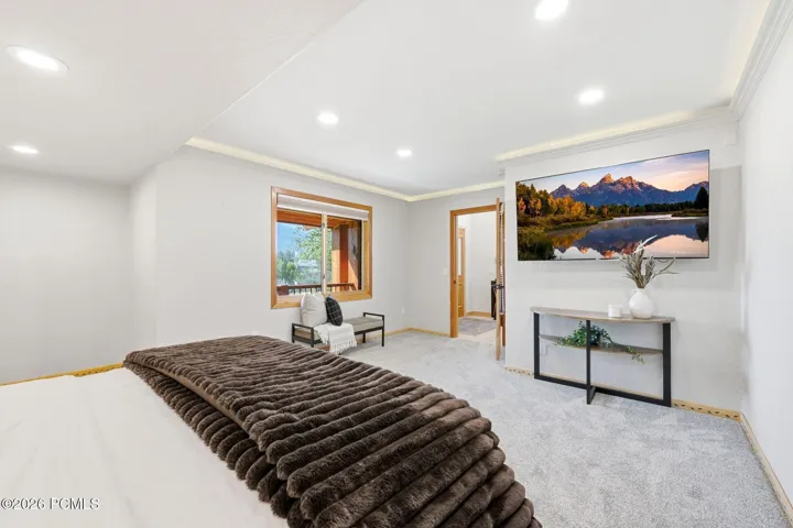 Guest Bedroom on the main level with tons of natural light, and spectacular views of the Canyons and Park City Ski Resorts.