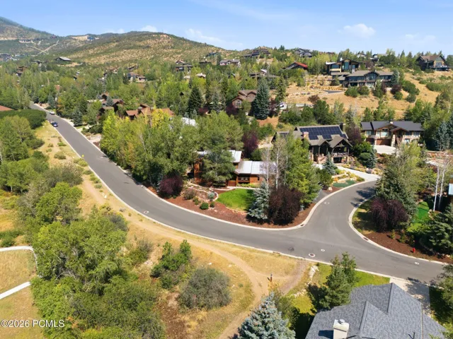 Secluded corner lot located directly across the street from one of the many trailheads in the neighborhood.