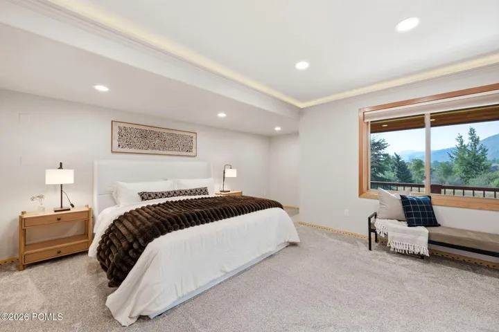 Guest Bedroom on the main level with tons of natural light, and spectacular views of the Canyons and Park City Ski Resorts.