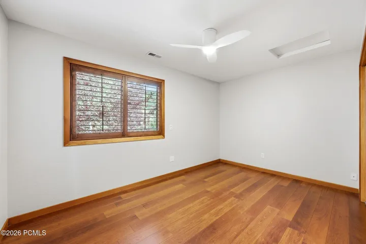 3rd upper level bedroom with hardwood floors and ample closet space.