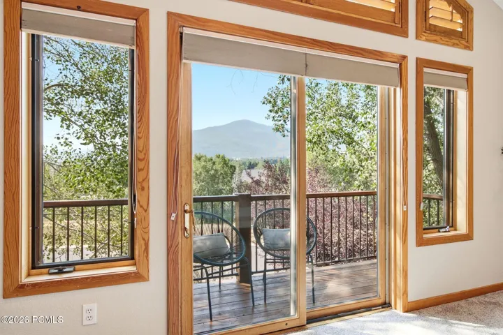 Private balcony with views of the mountains and ski resorts right in the comfort of your primary suite!
