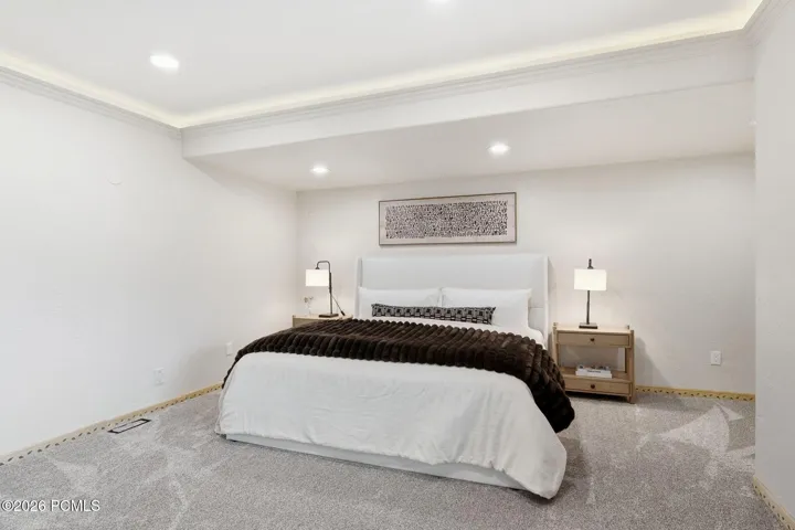 Guest Bedroom on the main level with tons of natural light, and spectacular views of the Canyons and Park City Ski Resorts.
