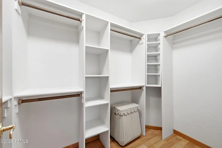 Primary bedroom walk-in closet.