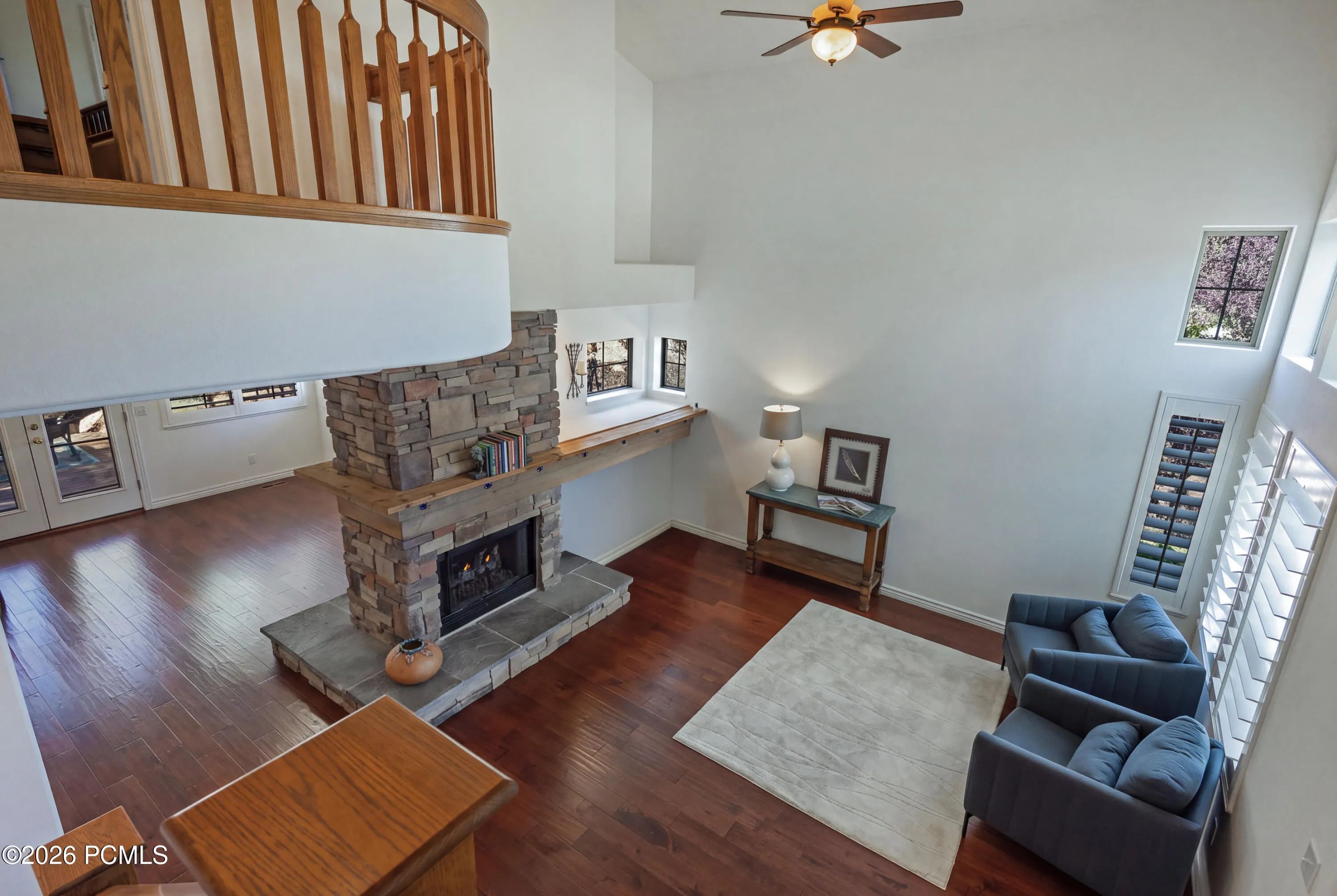 Looking Down on the Living & Family Room with Two-Sided Fireplace