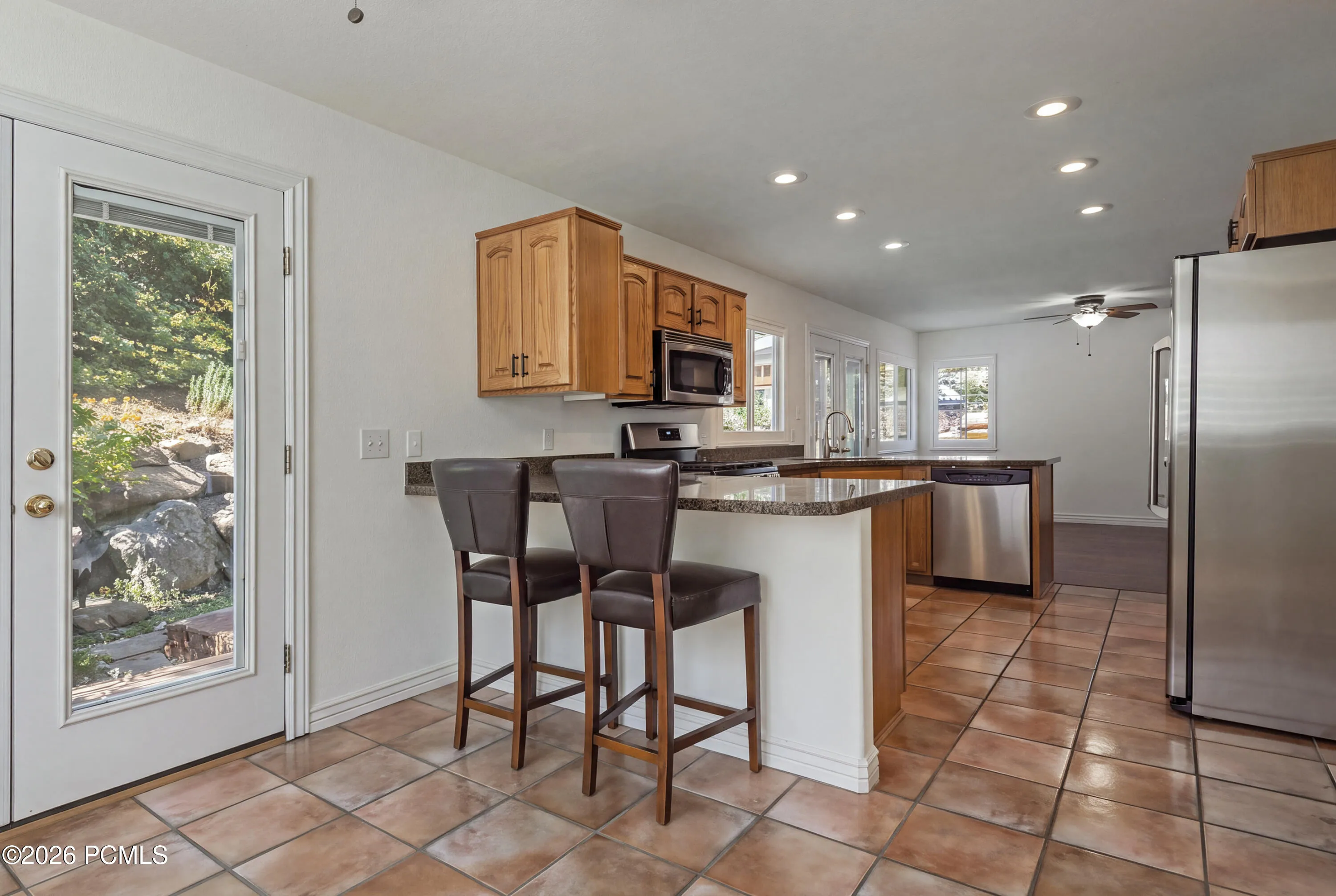 Dining Area to the Back Deck, Second Bar & Kitchen