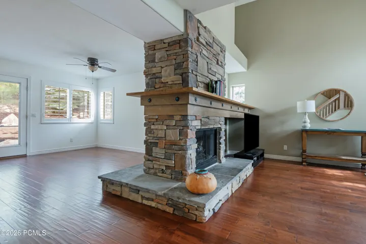 Two-Sided Fireplace between the Family Room and the Living Area