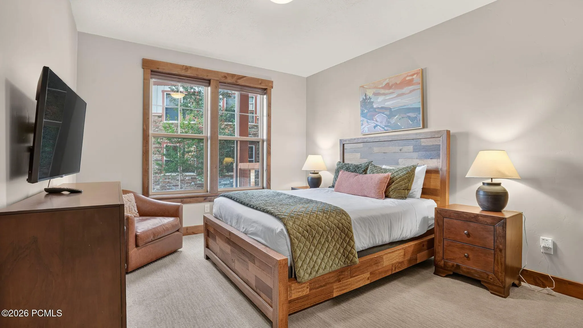 Second bedroom with mounted TV and treed views - Deer Park 102, Jordanelle, Heber City UT