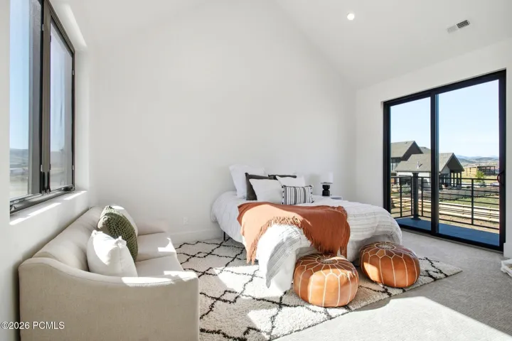 Bedroom 3 of 3 on upper level with out door access