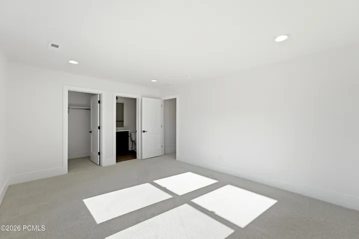 Upper level bedroom 1 of 3 with bathroom