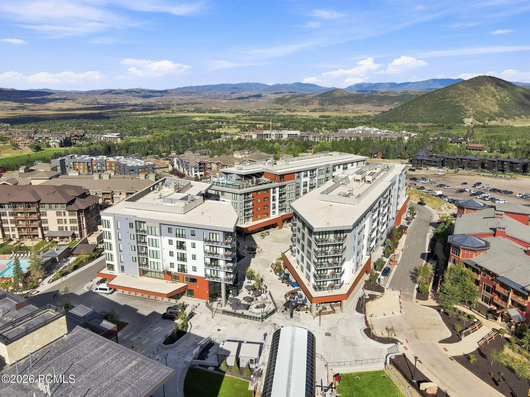 Aerial of Canyons Village and Pendry Residences Park City with Wasatch Back views beyond.