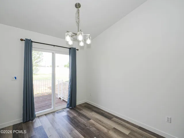 Semi-Formal Dining with Vaulted Ceiling, New Sliding Glass Door, & More