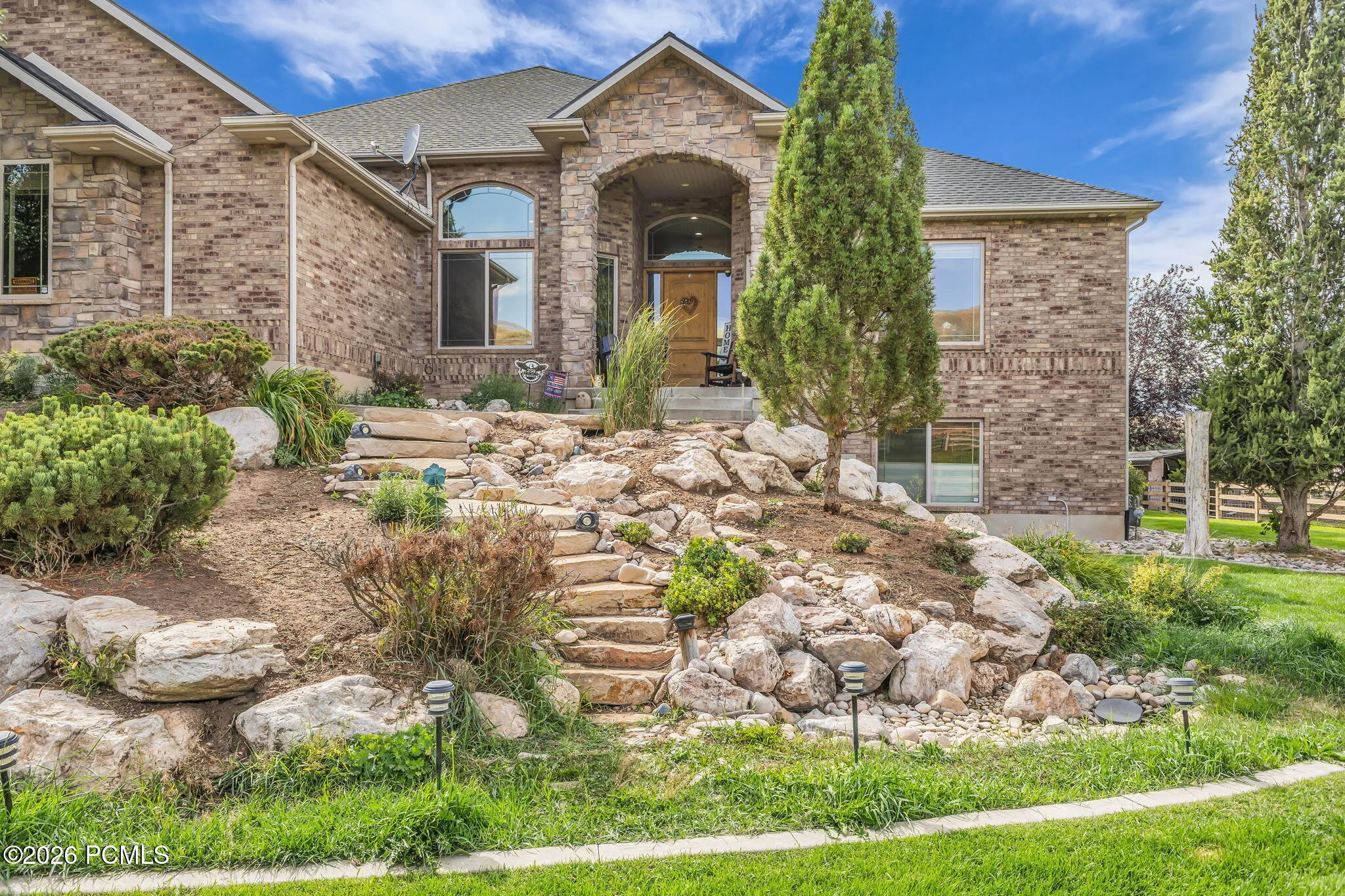 Exterior Front Entrance with rock waterfall
