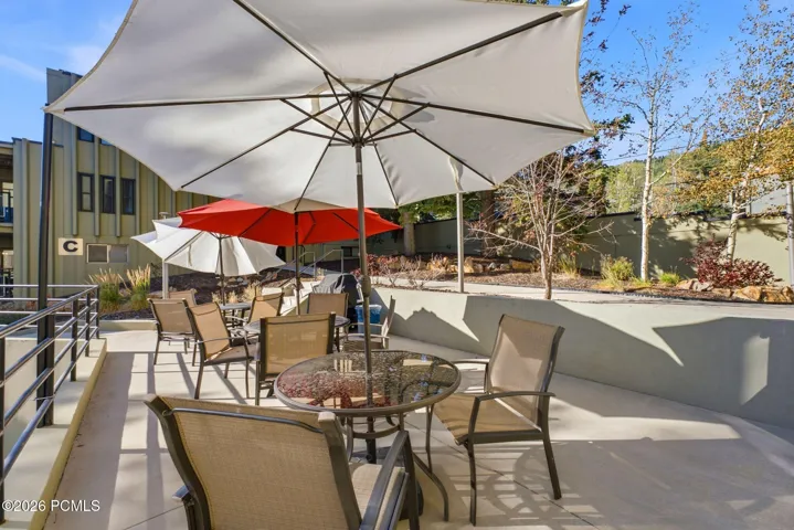 Patio area at pool with BBQ area for relaxing