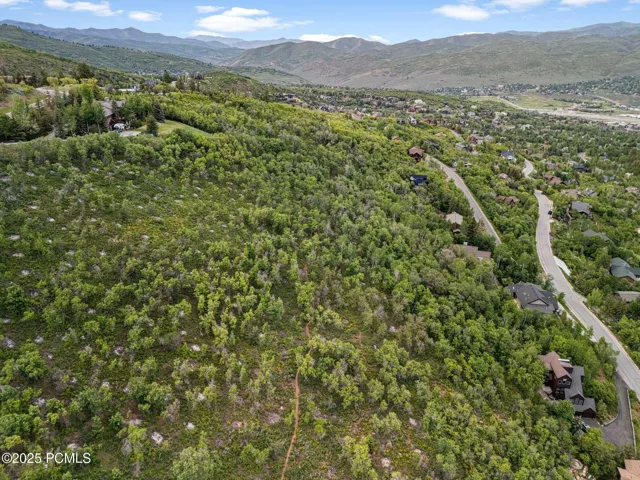 Elevated perspective looking out over the Snyderville Basin and I-80 corridor - minutes to Kimball Junction, Quarry Village, and Park City Mountain.