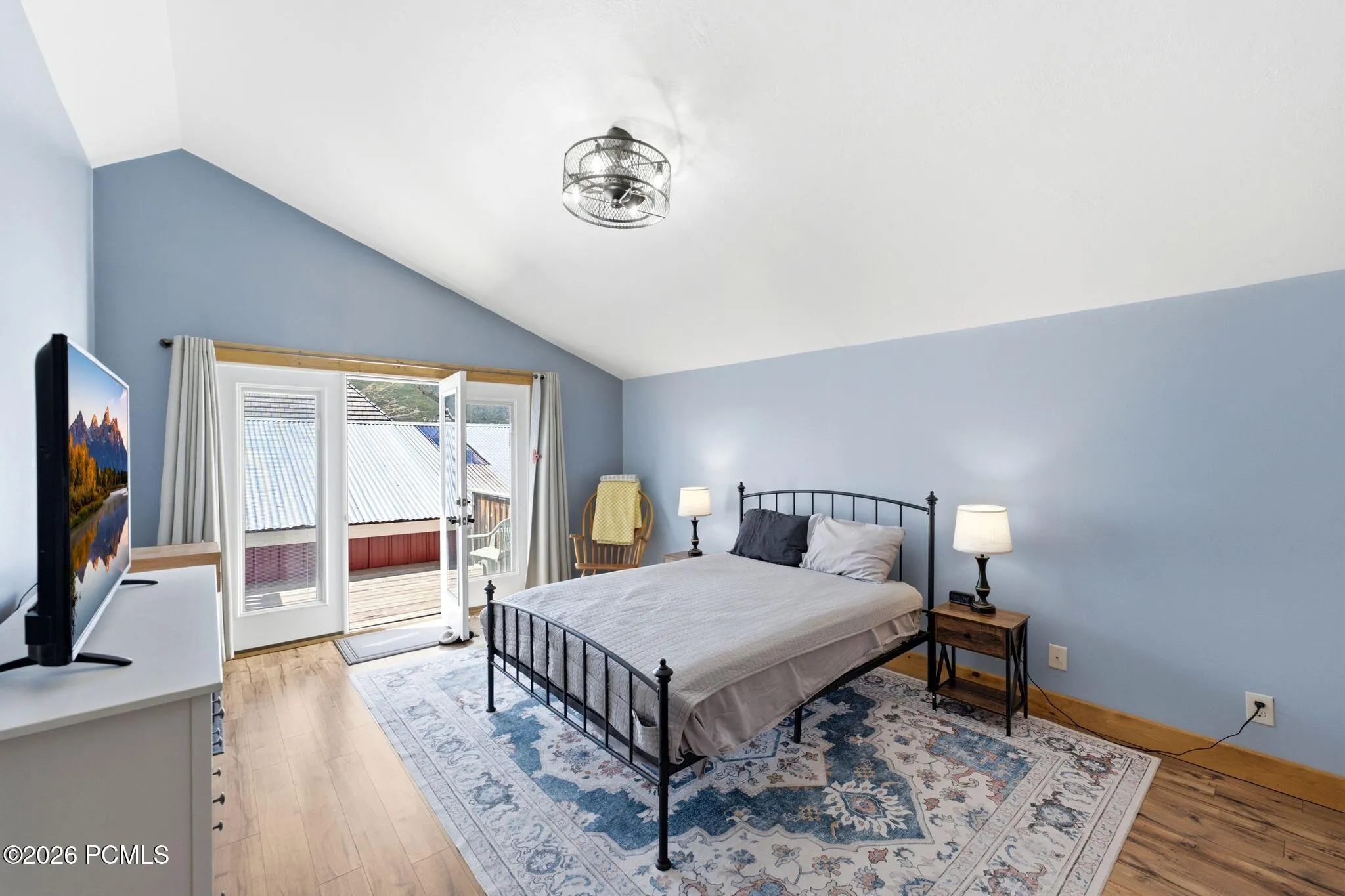 2nd story bedroom with French Doors to private deck