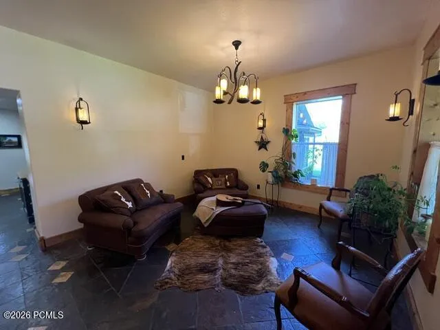 Slate tile flooring with decorative inlay