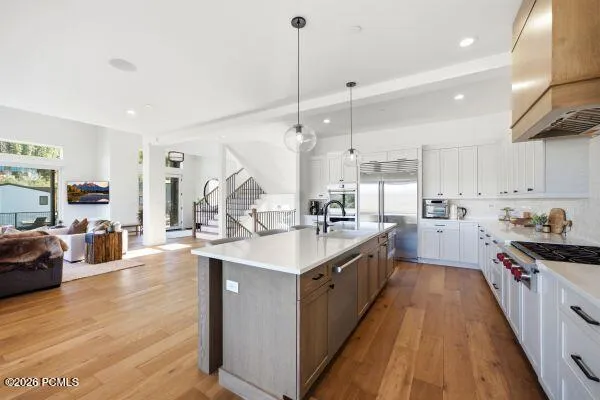 The photos are renderings only - these photos are for a similar unit in Discovery Ridge. Not this actual model.