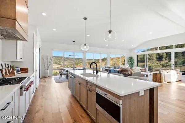 The photos are renderings only - these photos are for a similar unit in Discovery Ridge. Not this actual model.