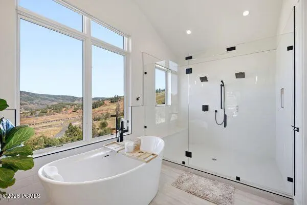The photos are renderings only - these photos are for a similar unit in Discovery Ridge. Not this actual model.