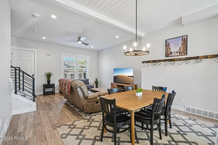 Great room from the dining side. Open layout with large windows.