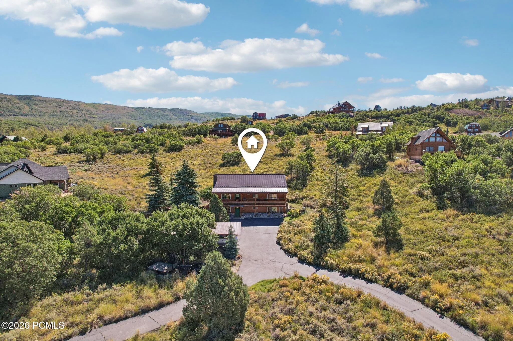 The home's position inside the gated Timber Lakes community, roughly seven miles up from Heber City.The home's position inside the gated Timber Lakes community, roughly seven miles up from Heber City.Aerial locator view marking the home's position within the gated Timber Lakes community east of Heber City.