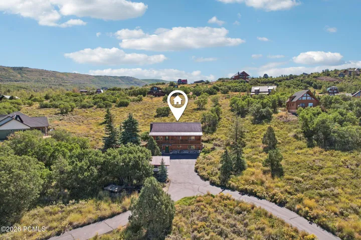 The home's position inside the gated Timber Lakes community, roughly seven miles up from Heber City.The home's position inside the gated Timber Lakes community, roughly seven miles up from Heber City.Aerial locator view marking the home's position within the gated Timber Lakes community east of Heber City.
